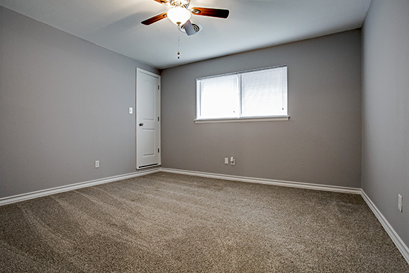 one of three bedroom with lots of closets