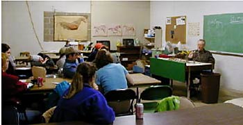Learning equestrian theory in the classroom.