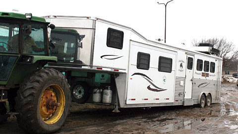 Stuck ' Expect the unexpected! Getting pulled out of the mud somewhere in Nebraska.