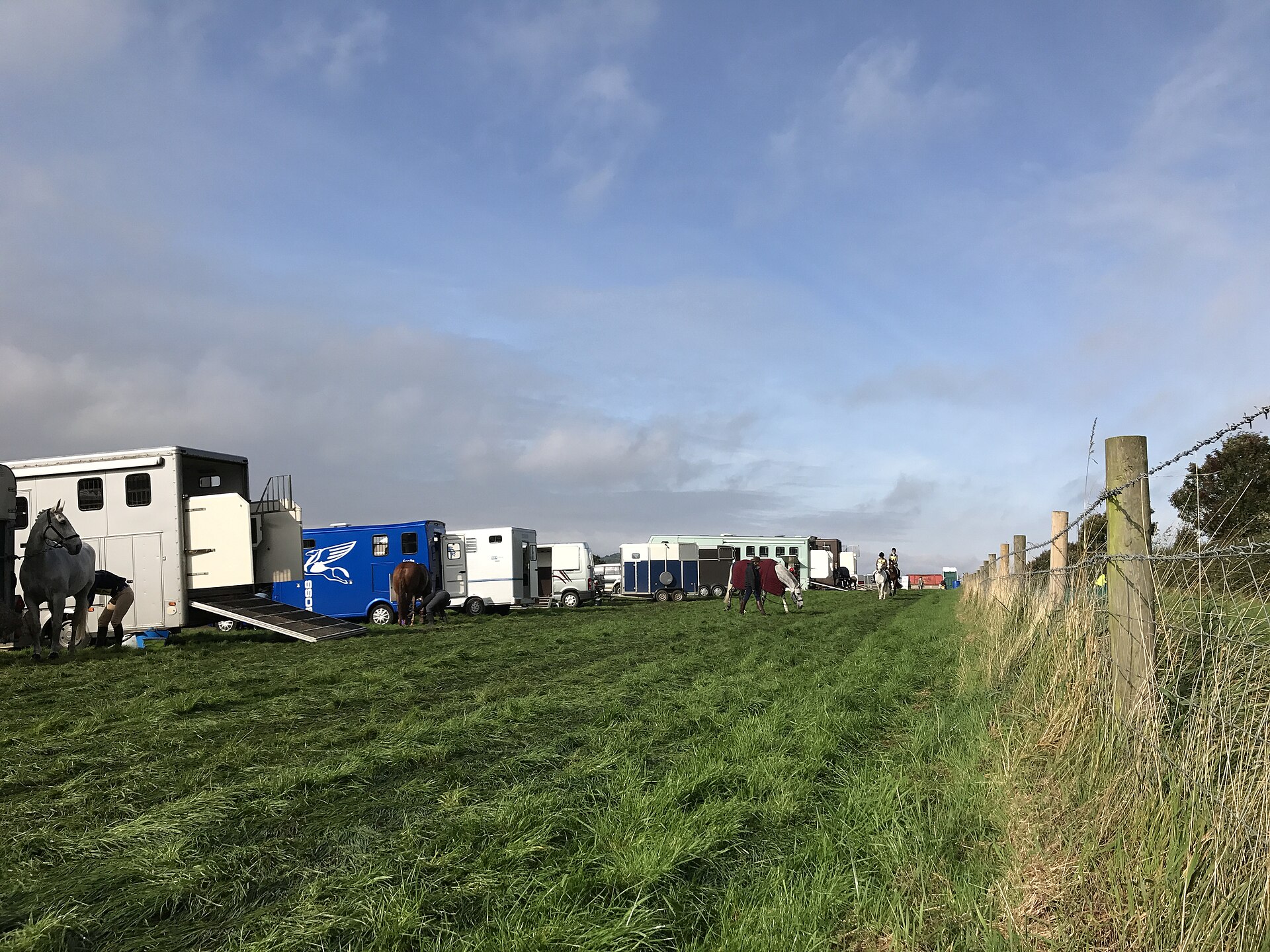 Ramps down in the lorry park at Kelsall Hill Horse Trials as eventers unload and prepare their horses