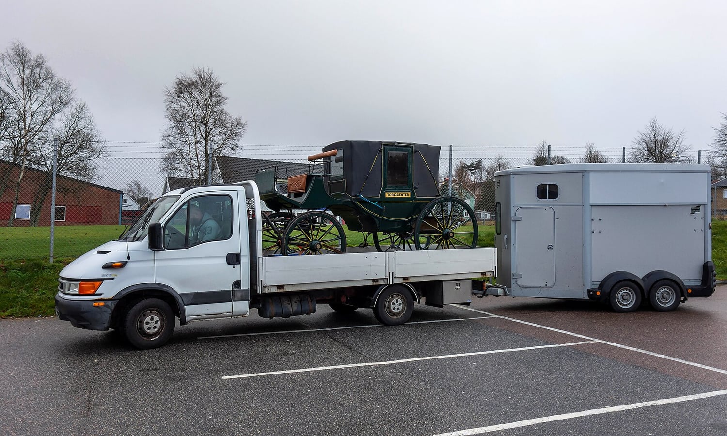 Truck, carriage, and horse trailer ready for travel
