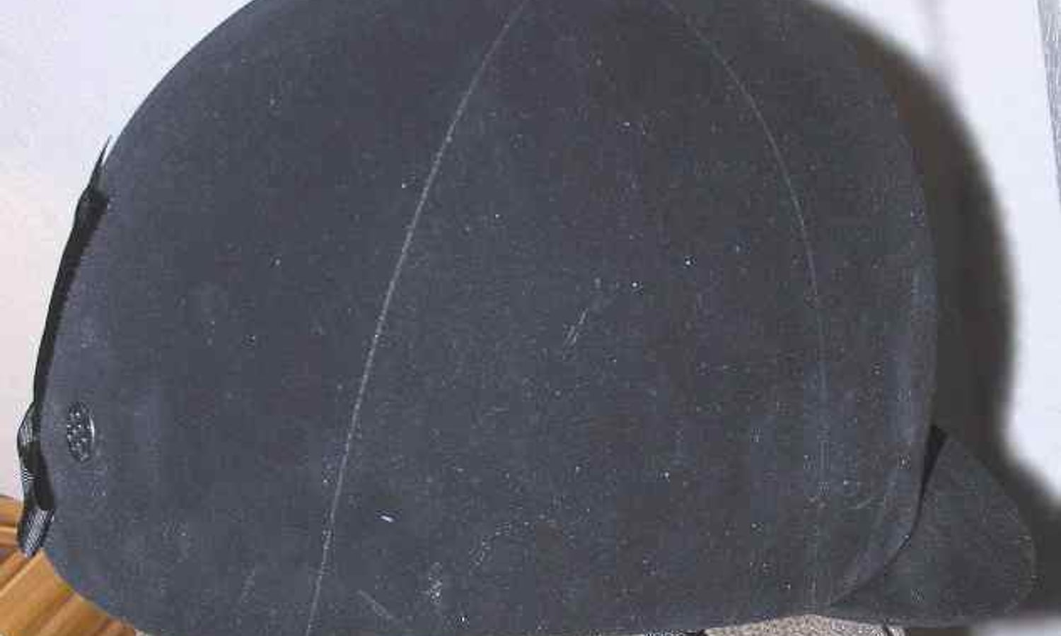 Velvet-covered equestrian safety helmet