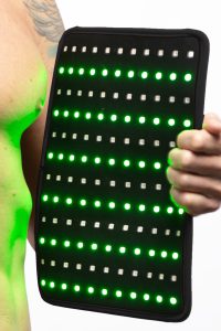 AAH Light VISUM Flex Pad glowing green for swelling and balance
