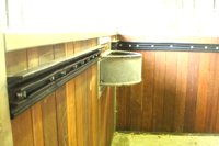 Up-Right Anti-Cast Safety Strips installed on horse stall walls to help a cast horse regain its feet