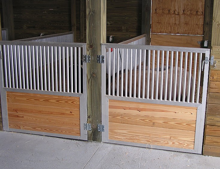 Armour miniature horse stall gates installed in a barn