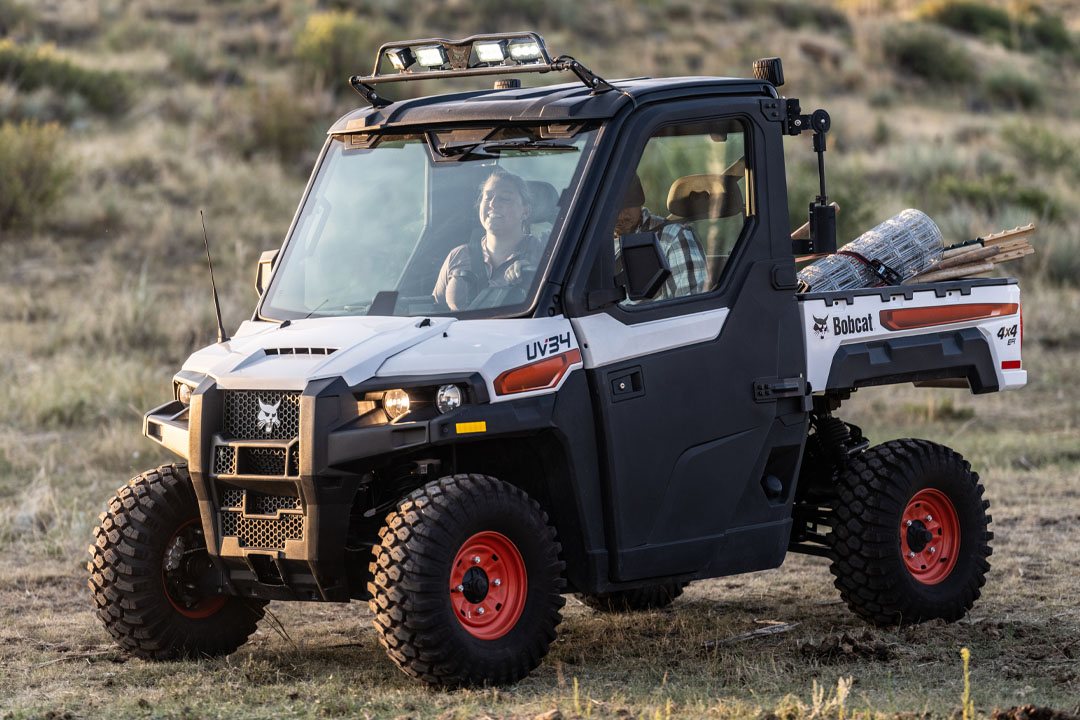 Bobcat UV34 utility vehicle hero shot for farm and ranch work