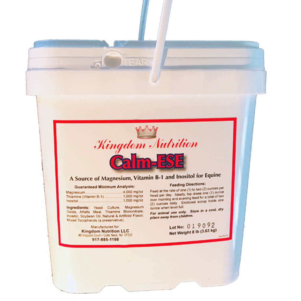 Eight-pound bucket of Calm-ESE equine calming powder showing the Kingdom Nutrition crown label and guaranteed analysis