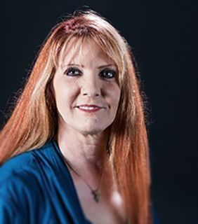 Portrait of psychic medium and animal communicator Carol Hensell