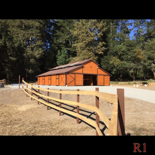 Castlebrook Barns steel-frame raised center aisle horse barn exterior