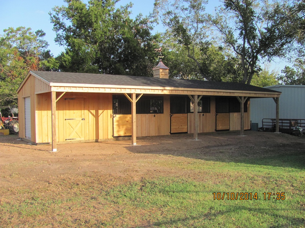 Deer Creek Structures 12x48 portable horse barn with 8-foot covered overhang