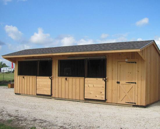 Deer Creek Structures cypress board and batten shed row horse barn