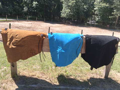 Rider mounted bareback on an El Compañero soft suede leather pad