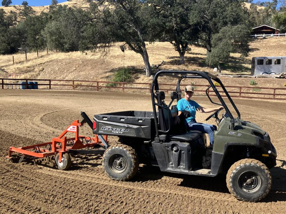 EZ Groomer arena drag groomer tilling and leveling horse arena footing behind a tractor