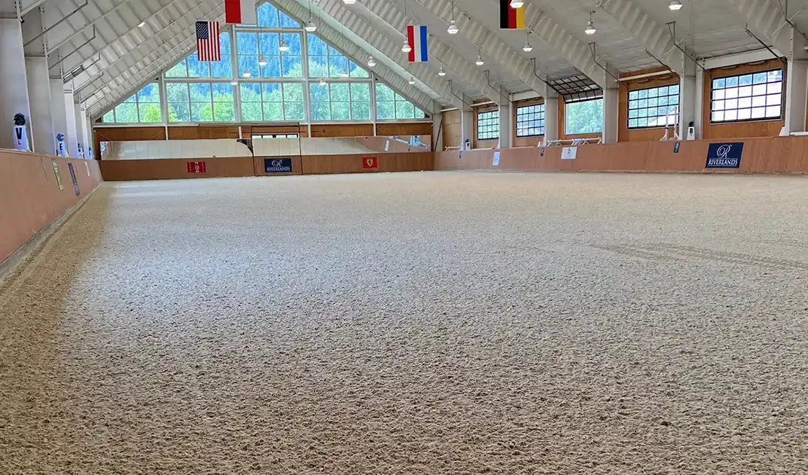 Bright FootingFirst TravelBright surface installed in a steel-framed indoor riding arena