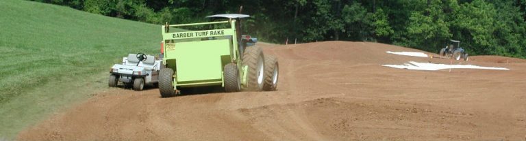 H. Barber & Sons TURF RAKE removing stones during golf course construction