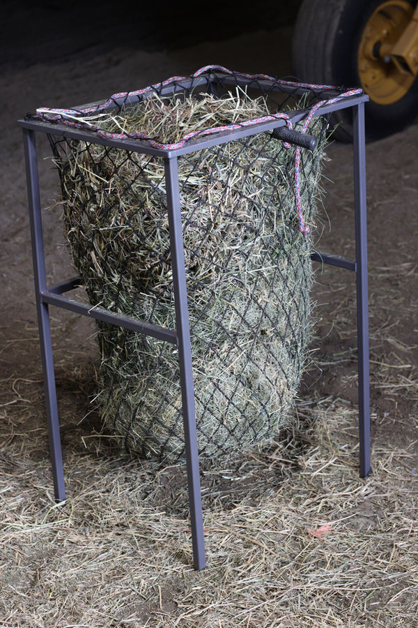 Free Standing Hay EZ hay net filler stand holding a hay net open and upright