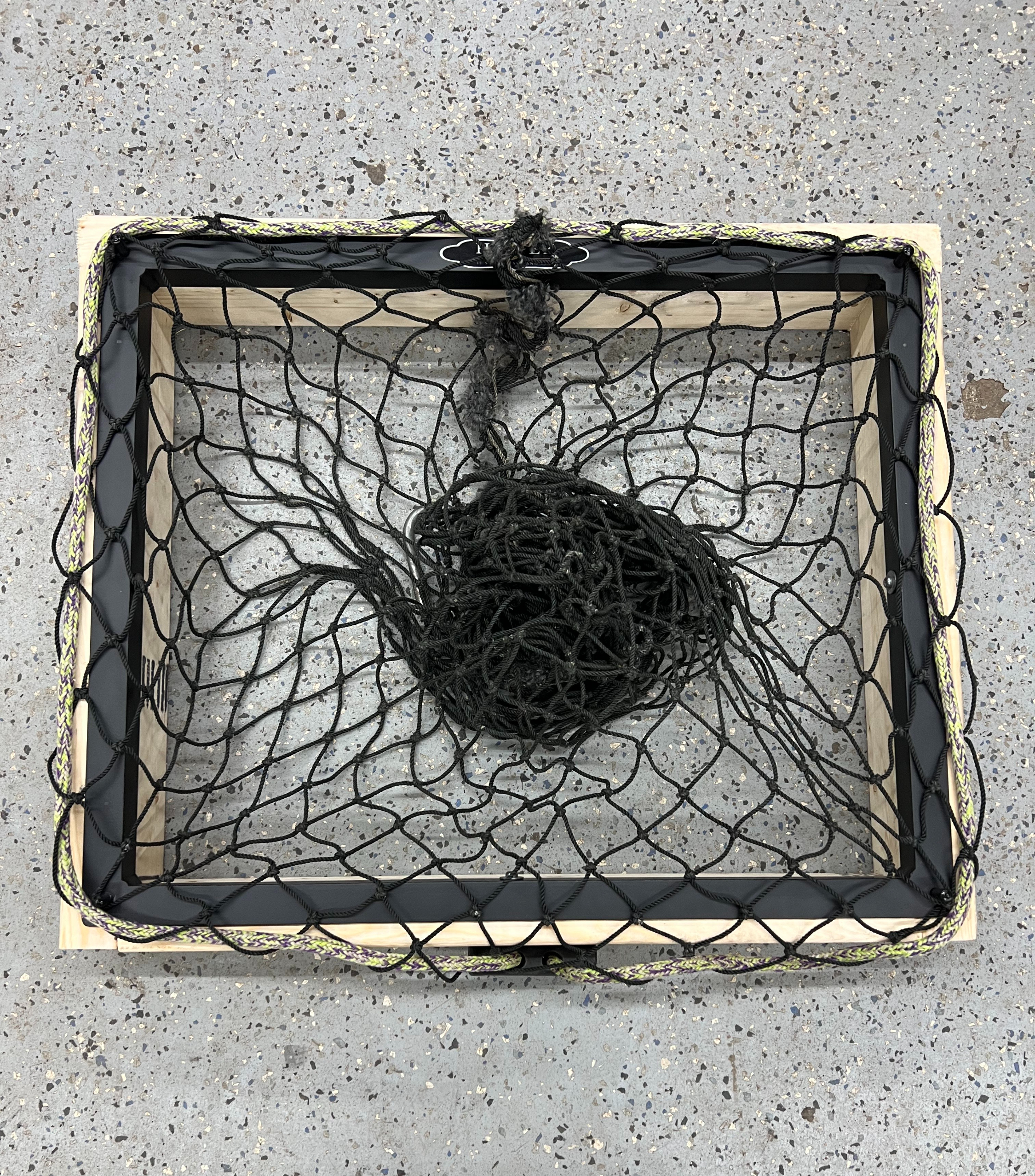 Table Mount Hay-EZ hay net filler that clamps to a surface for compact barn use