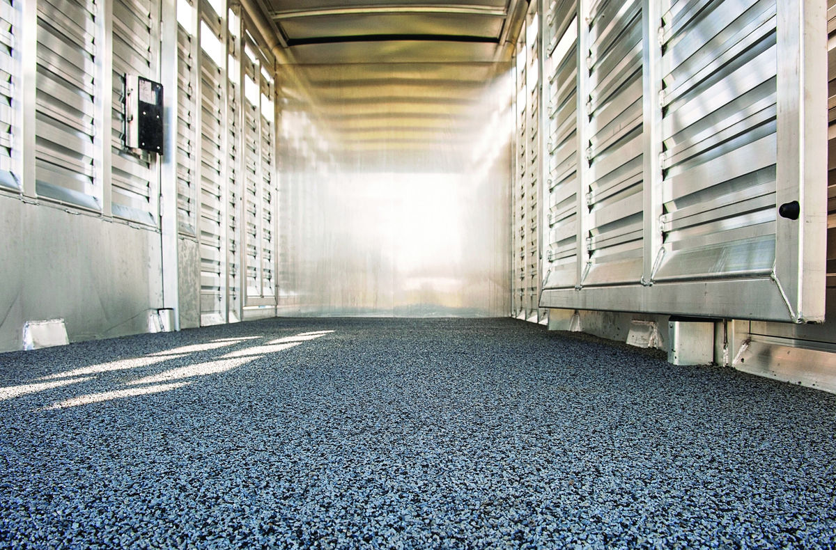 Hoof Grip seamless crumb rubber livestock flooring installed surface