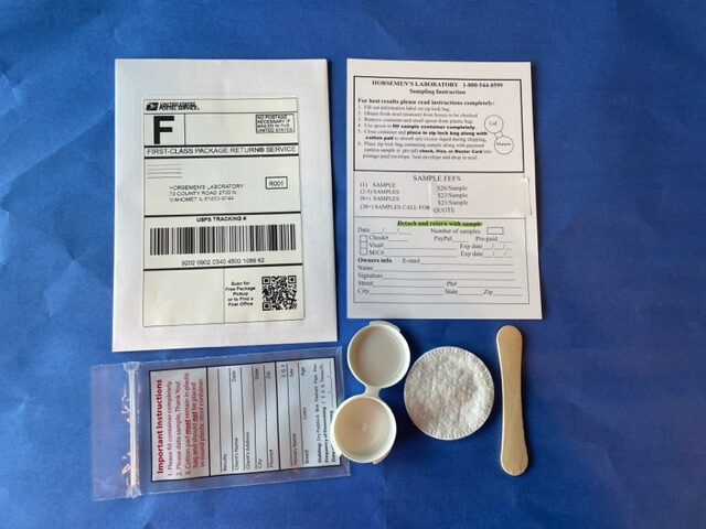 Horsemen's Lab mail-in fecal egg count test kit with container, scoop, prepaid envelope and instructions