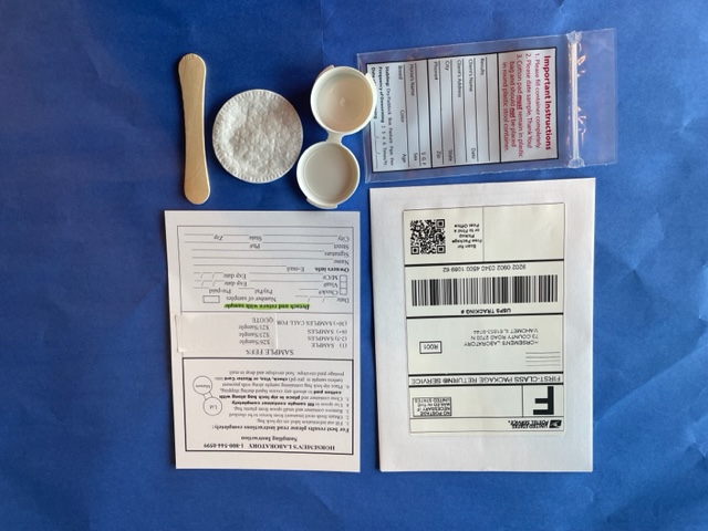 The Horsemen's Laboratory fecal egg count collection kit with prepaid return mailer, sample container, scoop and instructions
