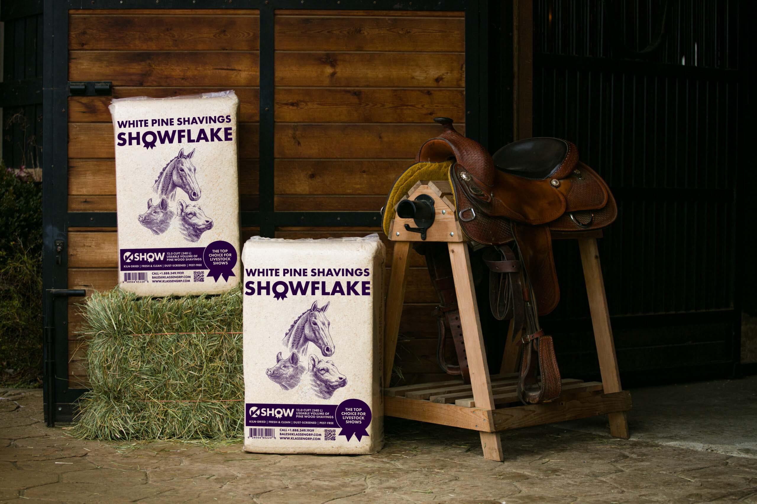 Klassen Wood Co. SHOWFLAKE shavings spread as clean white bedding in a horse barn stall