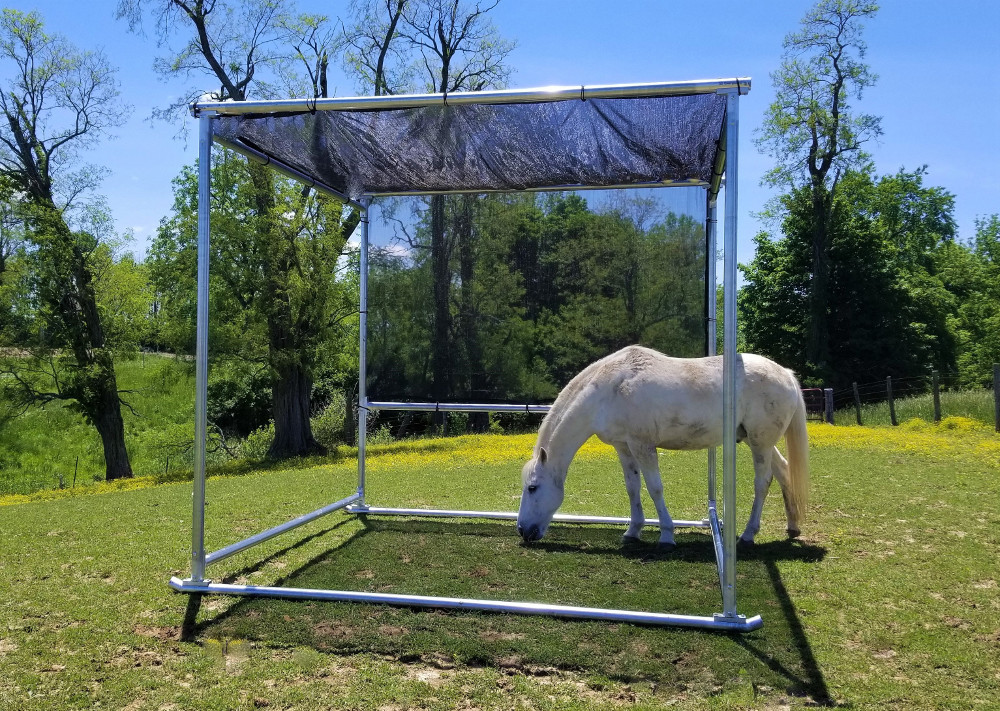 Klene Pipe Structures 10x10x9 portable shade structure for horses set up outdoors
