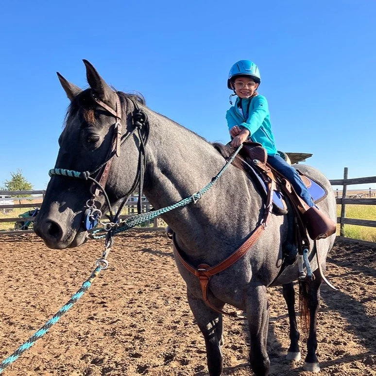 Beginner rider taking a western riding lesson at M&M Horse Training Ranch