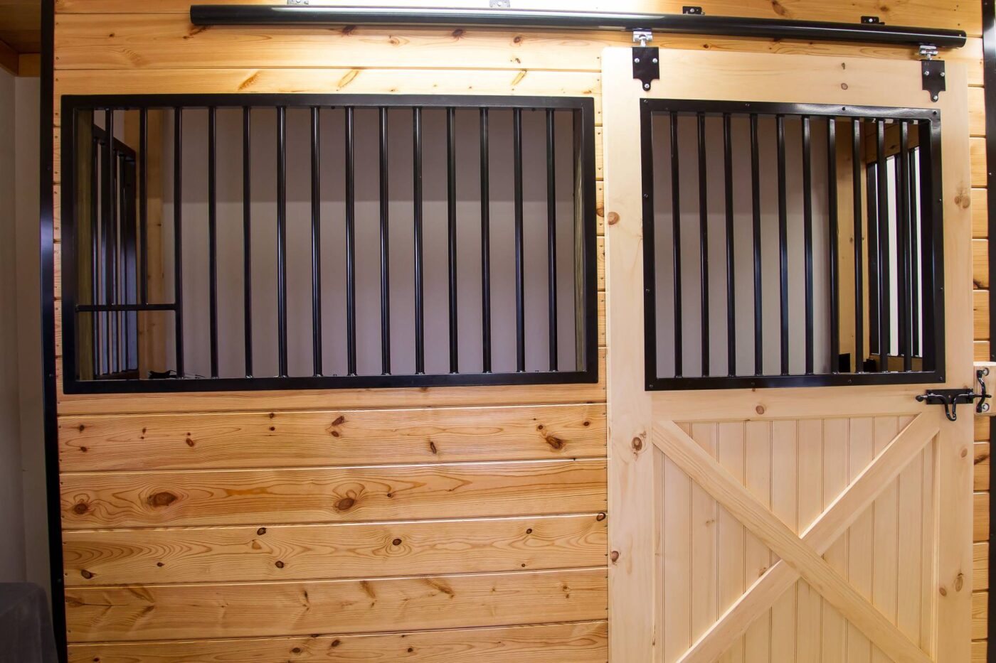 Handcrafted wood horse stall sliding doors by New Holland Supply