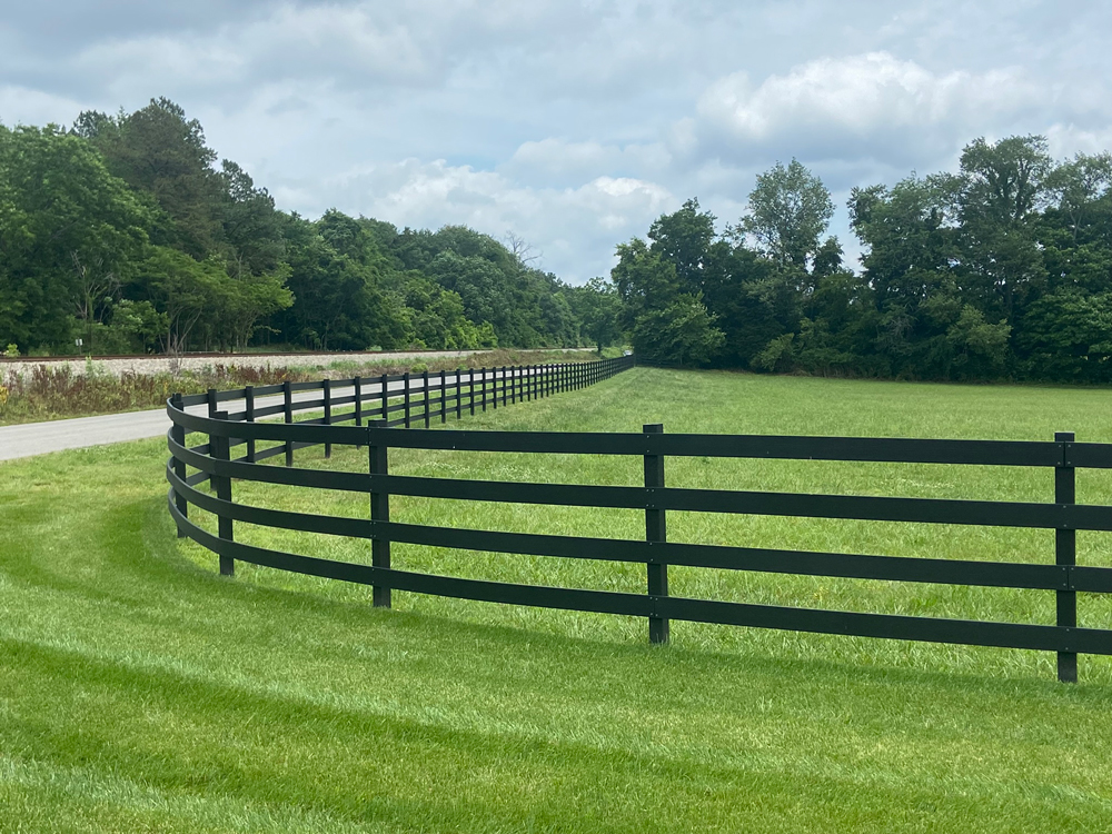 White Tangent Ranch-Rail Fence installed around a horse pasture