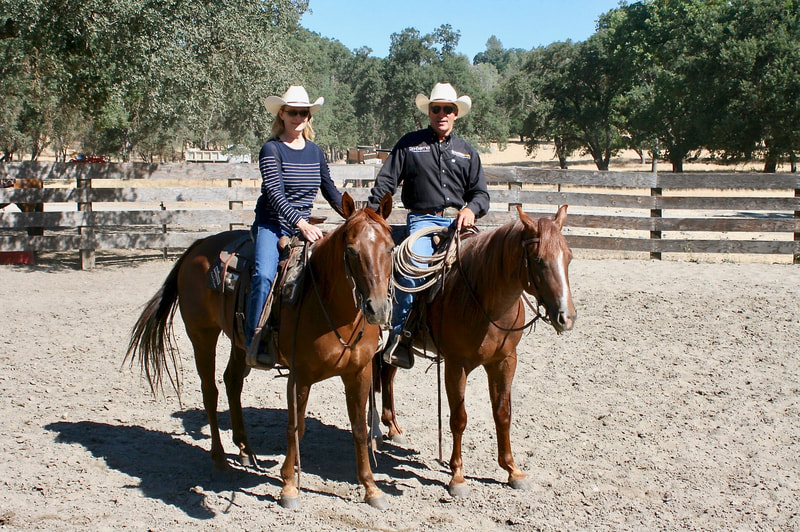 Richard and Cheryl Winters mounted together at their ranch arena