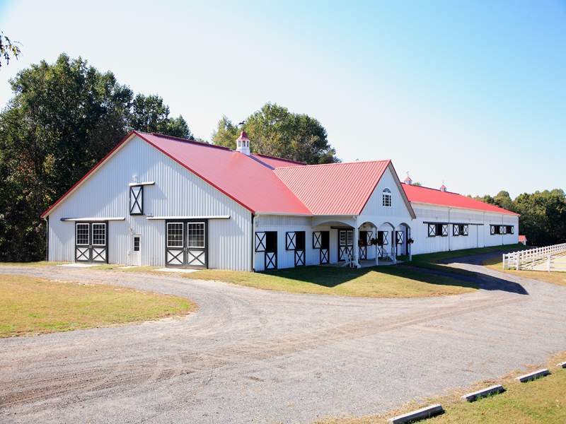 Rigidply Rafters lited equine Dutch door with impact-resistant acrylic window