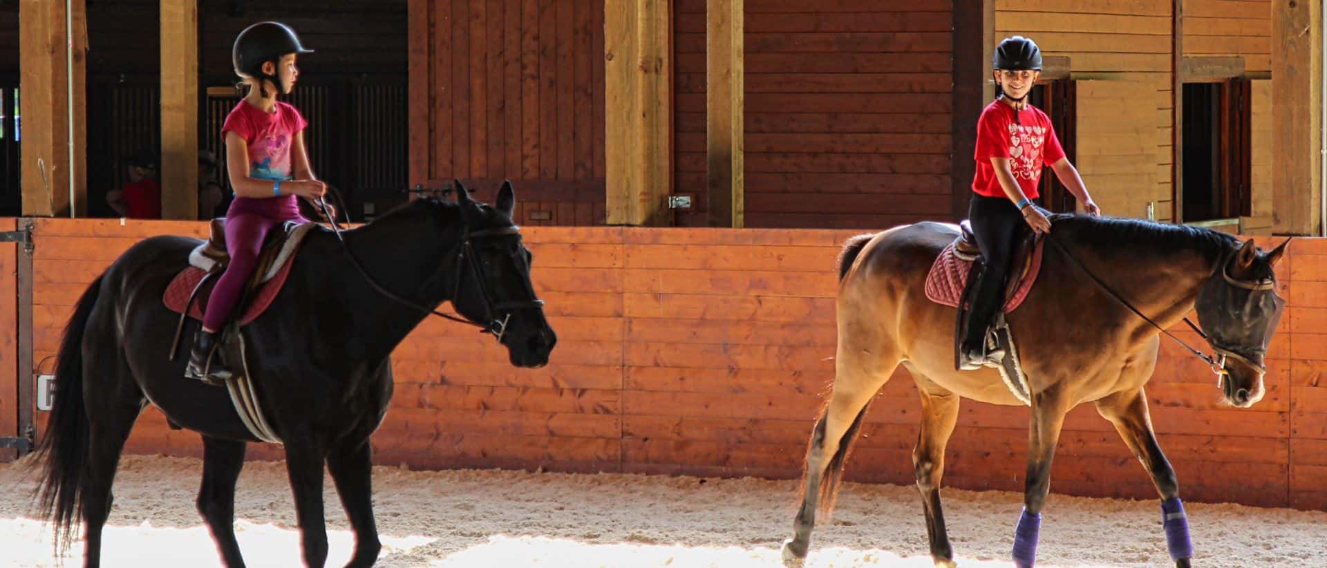 Rockbrook horseback riding camp campers mounted in the ring