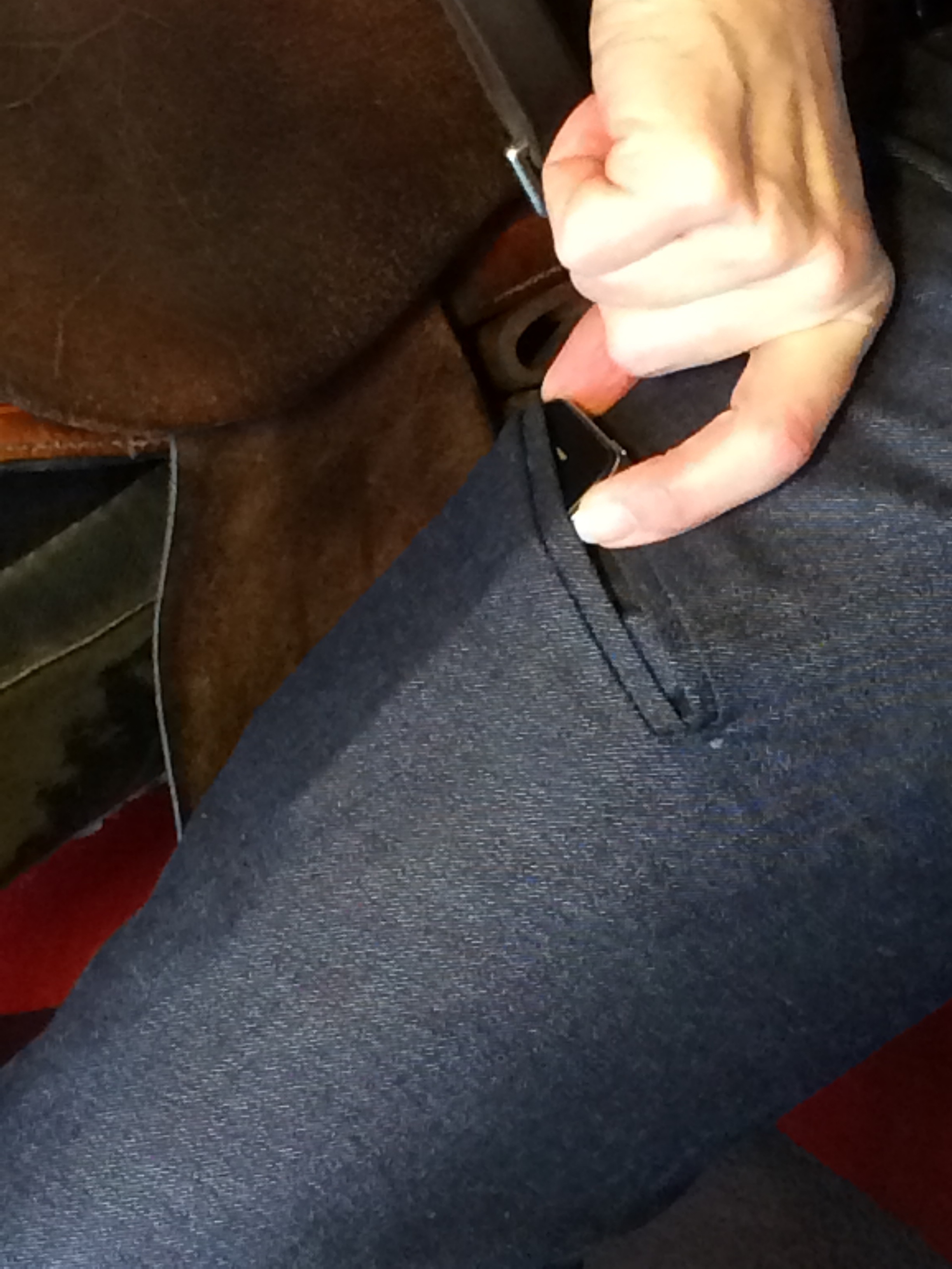 Smooth Stride angled welt cell-phone pocket on the right thigh in the saddle