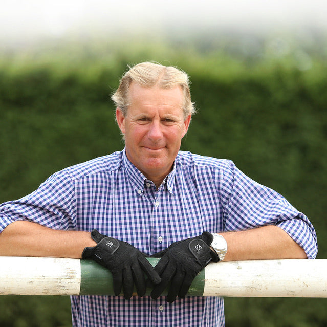 Rider wearing SSG 2100 Digital gloves holding reins lifestyle photo