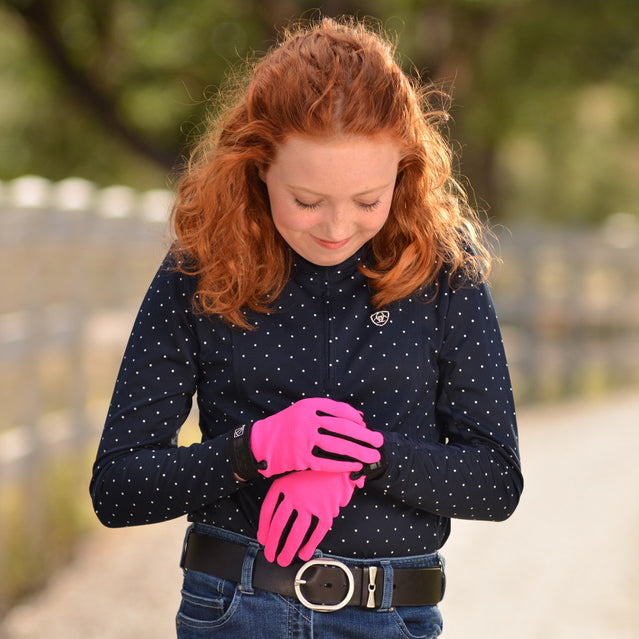 Rider wearing hot pink SSG 8600 All Weather gloves