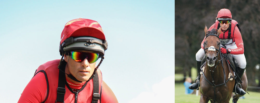 Event rider in a red cross-country vest and helmet cover wearing SSG wraparound sport sunglasses, and galloping across country