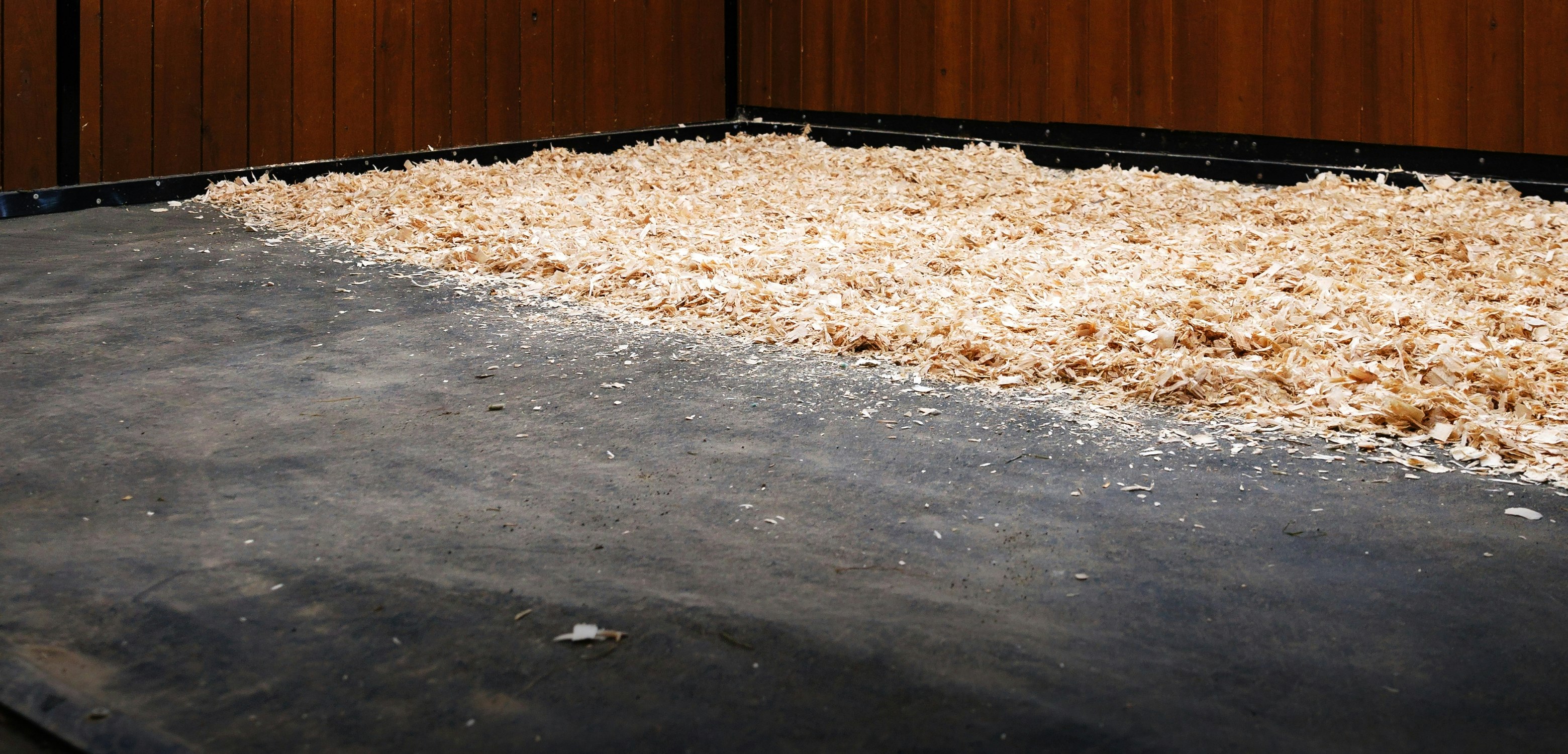 StableComfort horse stall mattress system installed wall-to-wall