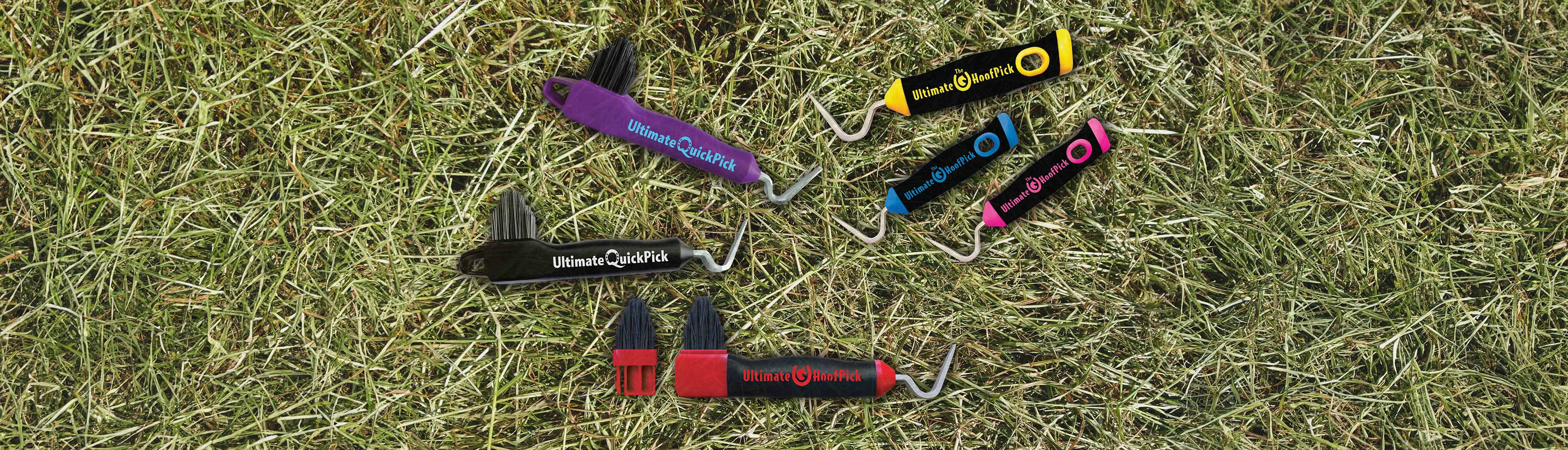 The full Ultimate QuickPick lineup in multiple colors laid out on green pasture grass