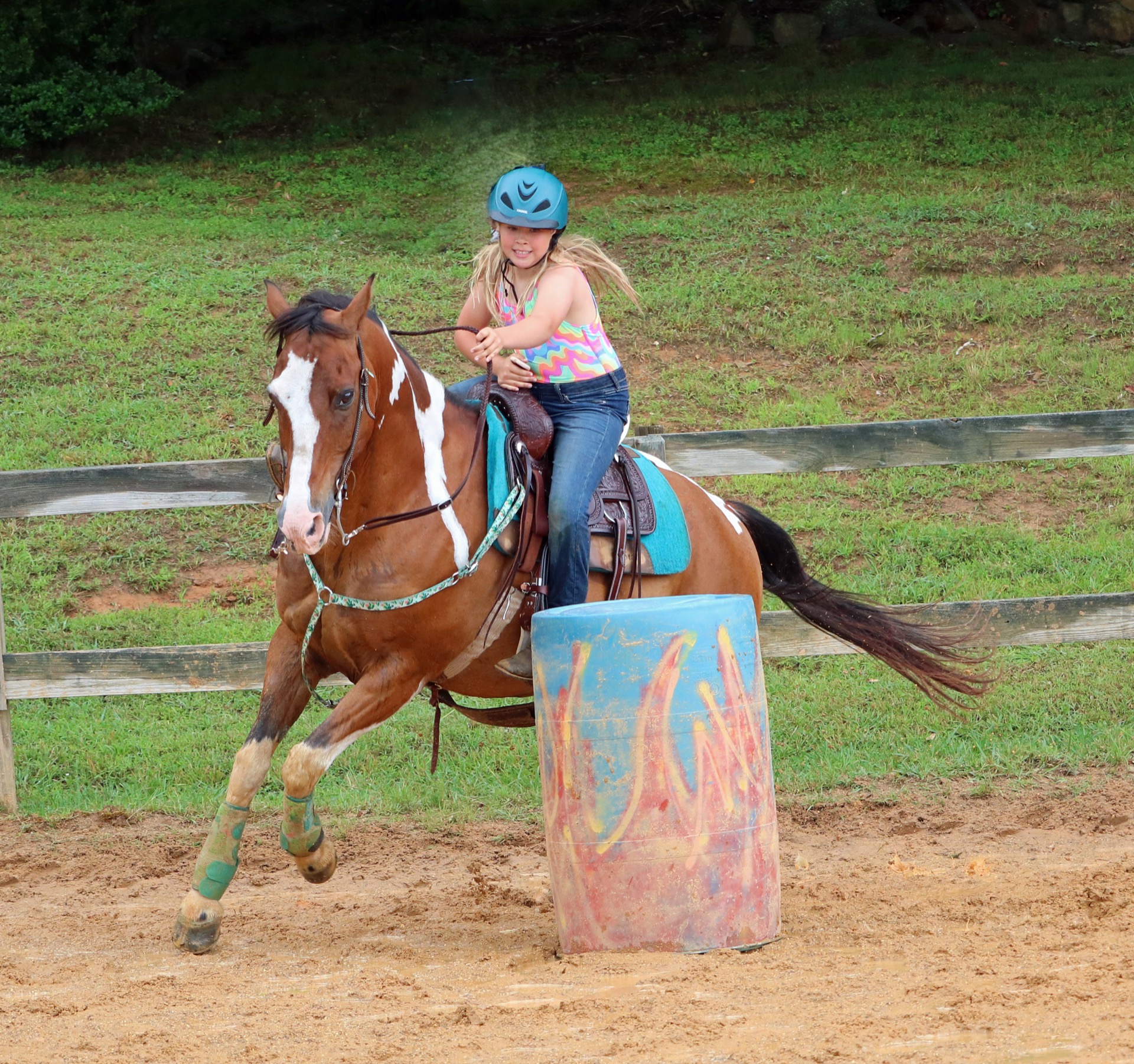 Camper barrel racing in the Rodeo Ring during gymkhana at Valley View Ranch