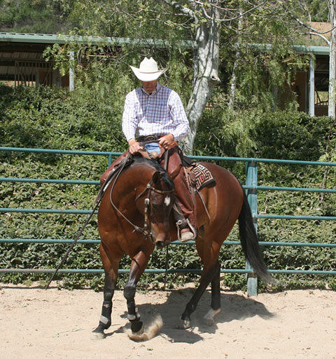 Incorrect; Riding with handcuffs. Notice the lack of distance between my hands