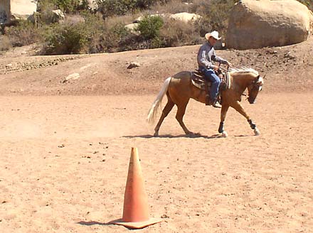 Loping Around Cone: Using a cone as a frame of reference can help keep your circles symmetrical.